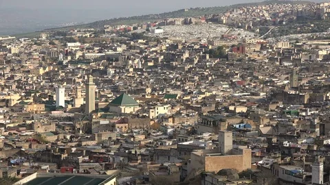 Mosque and residential neighborhood old city Fez in Morocco Stock Footage