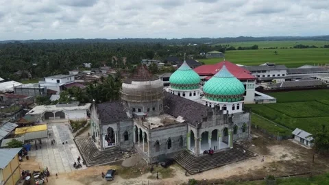Mosque building with the condition of one house not yet finished Stock Footage 142302392