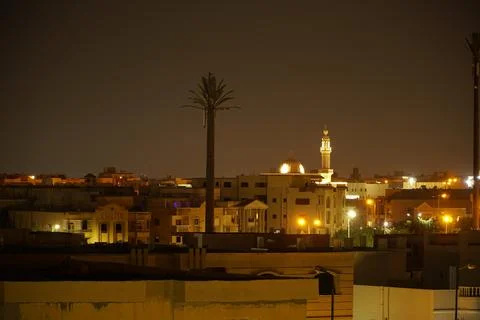 A mosque in Cairo lighting up during Ramadan at night Stock Photos