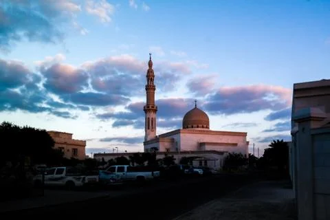 Mosque on a cloudy winter sunset Stock Photos