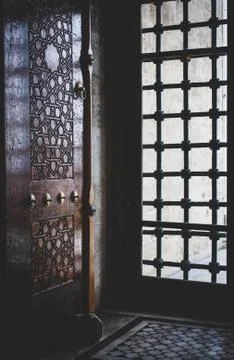 Mosque door with wooden lattice Stock Photos