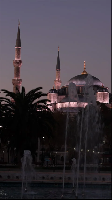 Mosque at dusk, with fair reflections shimmering on the water. Stock Footage 291523510