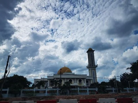 Mosque with Golden Dome and Dramatic Sky Stock Photos