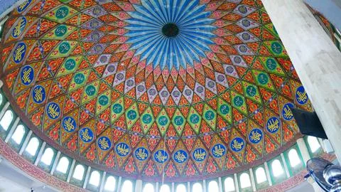 Mosque interior dome with calligraphy pattern. Stock Photos