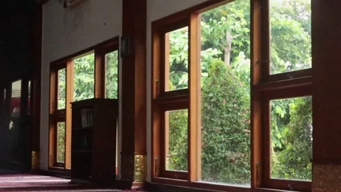 Mosque interior with a view of green trees outside Stock Footage 292903260