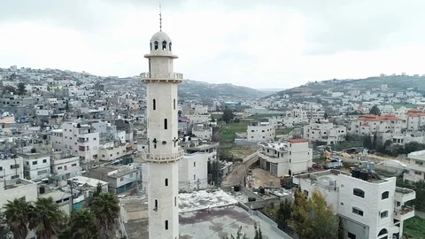Mosque over palestinian vilage Vídeos de archivo 111495808