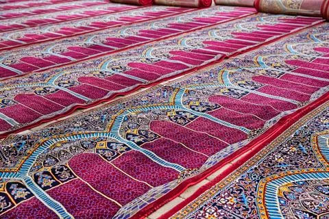 Mosque prayer carpets Stock Photos