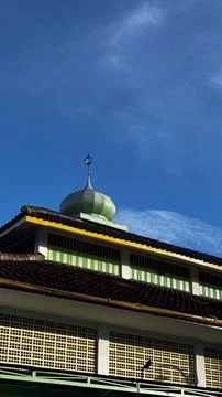 Mosque Rooftop Under Dark Blue Sky Stock Photos