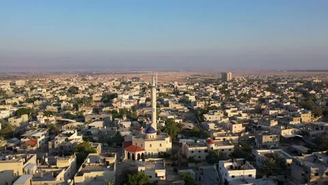 Mosque Tower minaret in Jericho city with Birds- aerial view Stock Footage 146200846