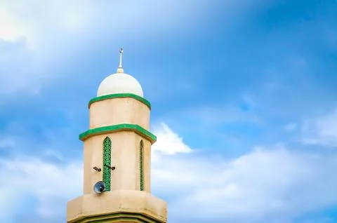 Mosque Tower Soaring into the Sky. Stock Photos