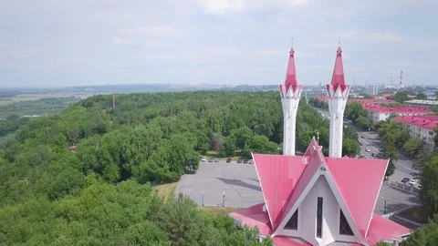 Mosque with two towers at the edge of the forest Stock Footage 92369389