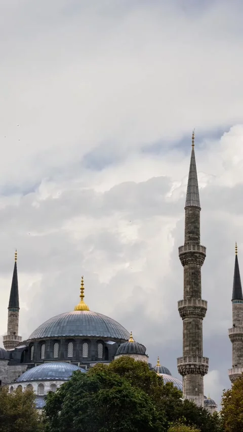 Mosque under cloudy skies, a serene Islamic  background for Ramadan themes Stock Footage 291509861