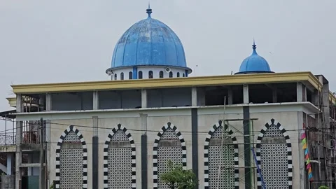 Mosque Under Construction with Blue Domes in Indonesia Stock Footage 332851598