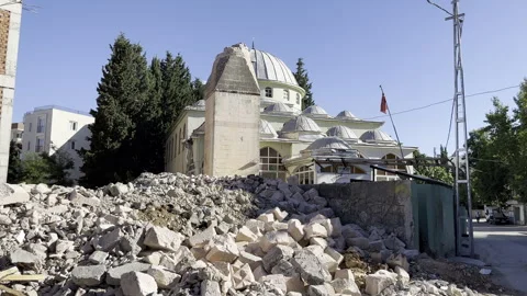A mosque whose minaret was destroyed and damaged in the earthquake Stock Footage 246448909