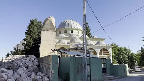 A mosque whose minaret was destroyed and damaged in the earthquake Stock Footage 246451382