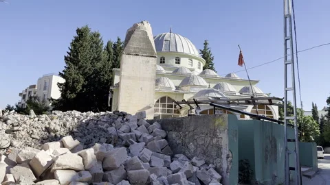 The mosque whose minaret was destroyed and damaged in the earthquake. Stock Footage 246451837