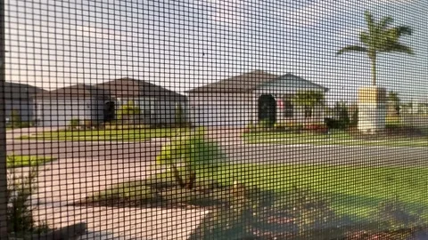 Mosquito net on the window Stock Footage 235668431