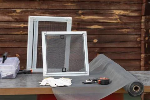 Mosquito nets samples. On open air. The desktop on which the products will be Stock Photos