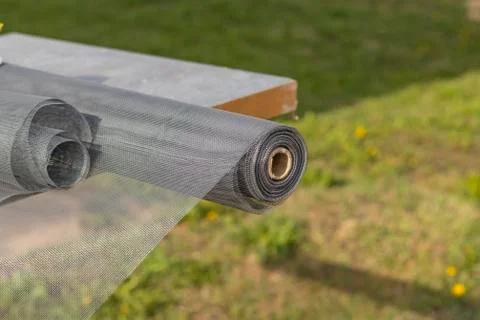 Mosquito nets samples. On open air. The desktop on which the products will be Stock Photos