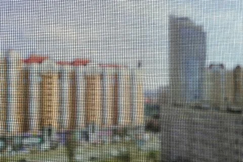 Mosquito Screen on a Window Stockfoto's