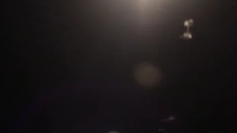 Mosquitos under the light, shaky hand shot Stock Footage 73824220