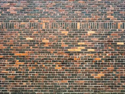 Moss-Adorned Brick Texture Background Stock Photos
