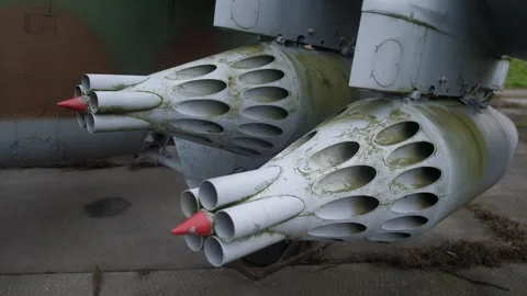 Moss covered rocket pods under wing. salvage technician documents corroded Stock Footage 321264595