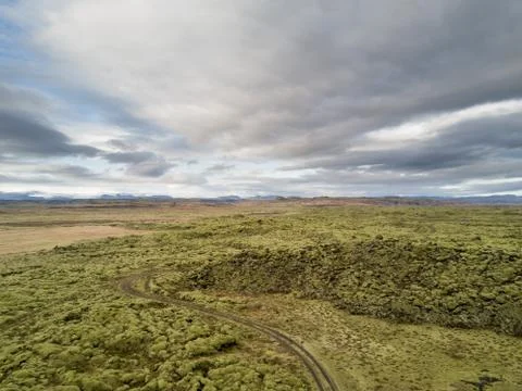 Moss fields and a road drone shot Stock Photos