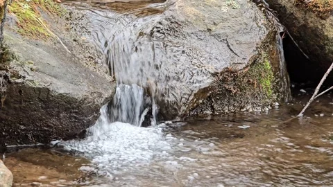 Mossy rock waterfall 3 60fps short clip Stock Footage 305018225