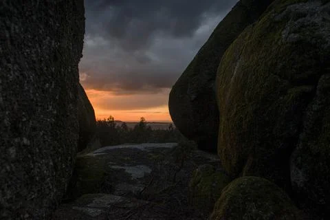 Mossy rocks at sunset Stock Photos