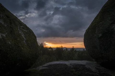 Mossy rocks at sunset Stock Photos
