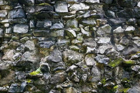 Mossy stone wall texture Stock Photos