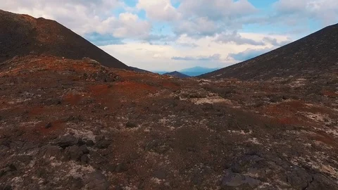 The most beautiful flight copter over the hardened lava. Flying through the fire Stock Footage 73102925