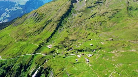 Most beautiful walking hiking path on top of a peaceful mountain in the Alps Stock Footage 246984011