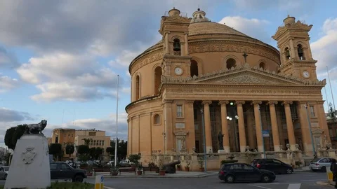 Mosta Dome timelapse of this iconic Maltese church with clouds Video stock 82168696