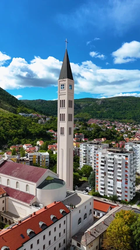 Mostar bell tower and franciscan monastery aerial view Stockbeeldmateriaal 341778497