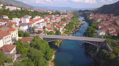 Mostar two bridge backwards Stock Footage 92852836