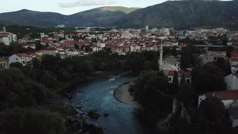 Mostar's Urban Blend: River, Mosques &amp; Homes Stock Footage 304519707