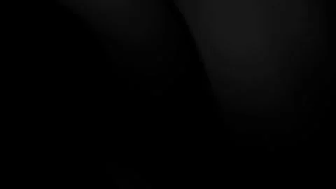 Mostly black background with subtle light gradients. Stock Footage 311404329
