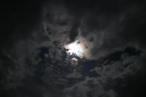 Mostly cloudy blue moon in the night. Foto stock