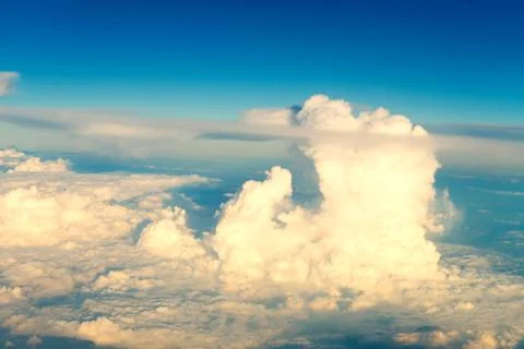 Mostly cloudy, with a view from the plane. Stock Photos
