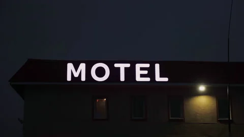 Motel rooftop LED sign that changes colors Stockbeeldmateriaal 201896832