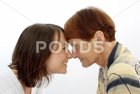 Mother, 60 years old, with daughter, 30 years old Stock Photos