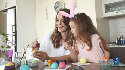 Mother and daughter preparing for easter, enjoing time together Stock Footage 126525468