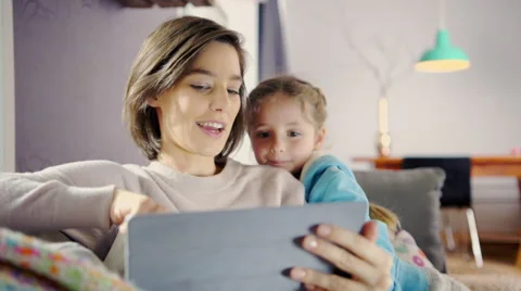 Mother and daughter with tablet Stock Footage