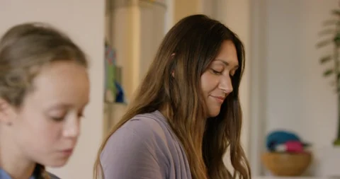 Mother And Daughter Talk While They Eat Breakfast Stock Footage 125024572