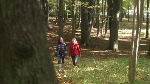 Mother and daughter walking in a forest, Stockholm Stock Footage