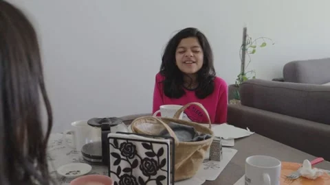 Mother and Daughters Breakfast — Close on Younger Girl Stock Footage 321645592