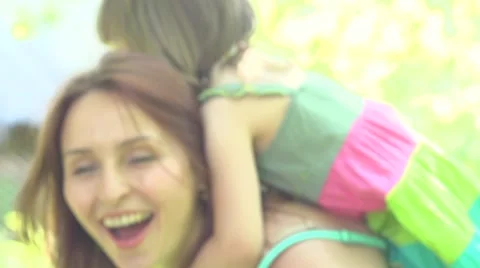 Mother and her little daughter having fun outdoors. Stock Footage 59089774