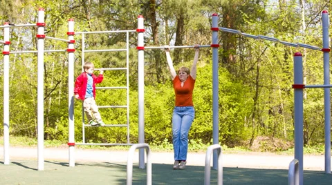 Mother and son are doing gymnastics 스톡 동영상 37722943